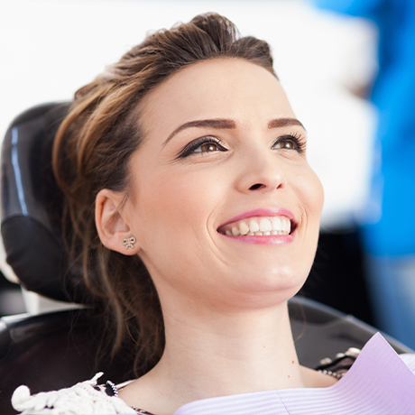 Smiling woman in dental chair