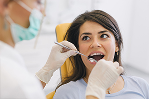 Woman receiving dental treatment